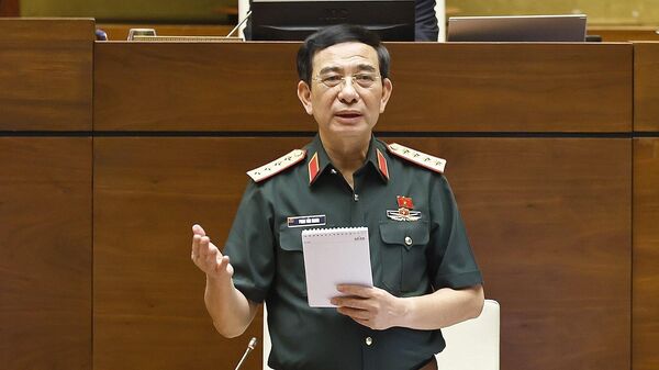 Đại tướng, Bộ trưởng Bộ Quốc phòng Phan Văn Giang giải trình, làm rõ một số vấn đề đại biểu Quốc hội nêu - Sputnik Việt Nam