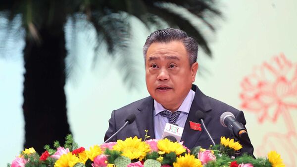 Đồng chí Trần Sỹ Thanh, Ủy viên Trung ương Đảng, Phó Bí thư Thành ủy, Chủ tịch UBND thành phố Hà Nội trình bày dự thảo Chương trình hành động thực hiện Nghị quyết Đại hội Đảng bộ Thành phố lần thứ 18, nhiệm kỳ 2025 – 2030
 - Sputnik Việt Nam