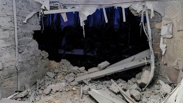 Hậu quả của cuộc tấn công bằng máy bay không người lái của Ukraina vào làng Khorly thuộc vùng Kherson. - Sputnik Việt Nam