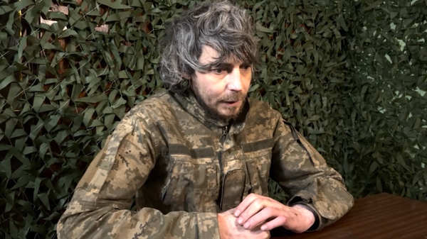 Các phần tử biệt kích phá hoại Ukraina cố gắng rời khỏi Krasnoarmeysk trong trang phục dân thường - Sputnik Việt Nam