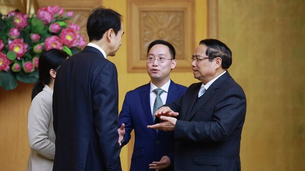 Thủ tướng Phạm Minh Chính tiếp Đại sứ Trung Quốc tại Việt Nam Hà Vĩ.  - Sputnik Việt Nam