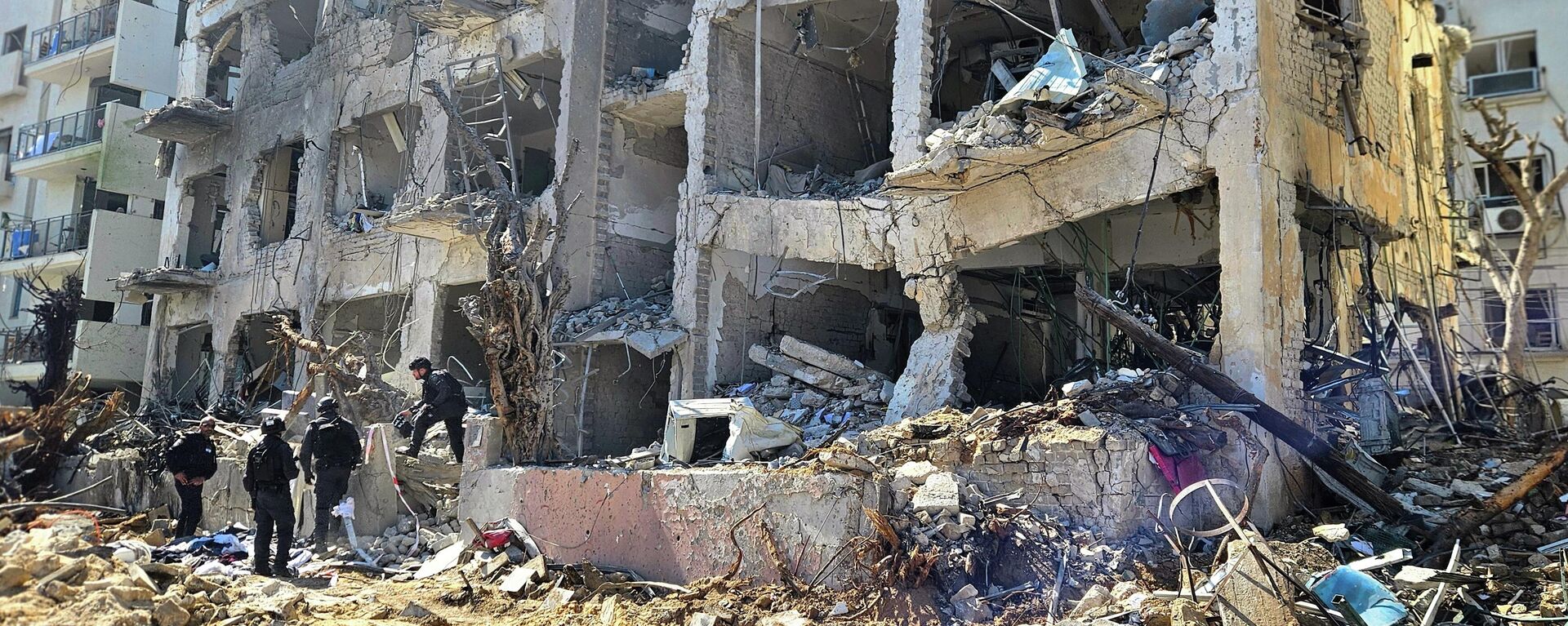 Sự tàn phá ở Tel Aviv sau cuộc tấn công tên lửa của Iran - Sputnik Việt Nam, 1920, 15.03.2026