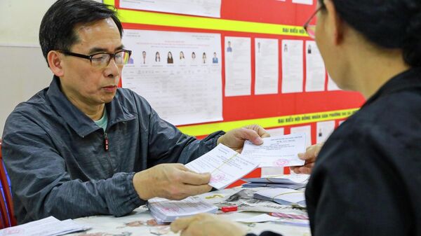 Tại Hà Nội, các khu vực bỏ phiếu đang hoàn tất những khâu chuẩn bị cuối cùng cho bầu cử ĐBQH và HĐND các cấp - Sputnik Việt Nam