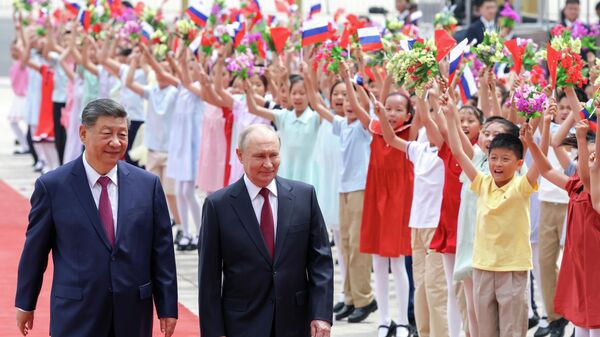 Tổng thống Nga Vladimir Putin và Chủ tịch Trung Quốc Tập Cận Bình trong cuộc gặp tại Bắc Kinh - Sputnik Việt Nam