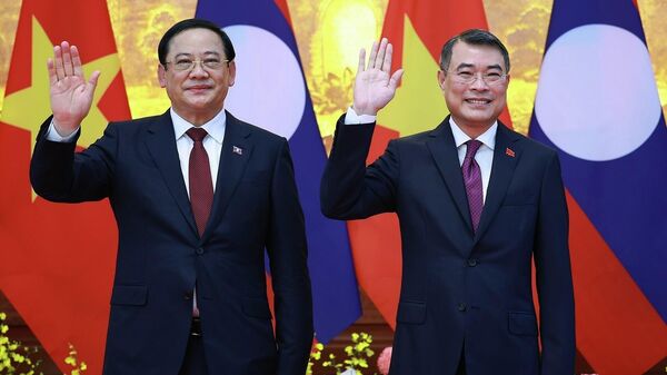 Thủ tướng Lê Minh Hưng và Thủ tướng Lào Sonexay Siphandone hội đàm - Sputnik Việt Nam