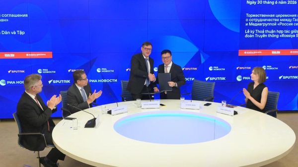 Rossiya Segodnya và báo Nhân Dân Việt Nam ký kết thỏa thuận hợp tác - Sputnik Việt Nam