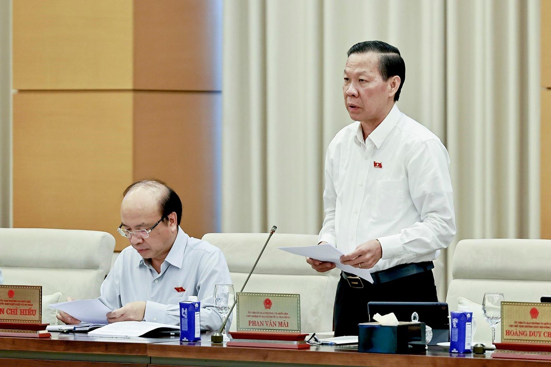 Chủ nhiệm Ủy ban Kinh tế và Tài chính của Quốc hội Phan Văn Mãi trình bày tóm tắt báo cáo thẩm tra sơ bộ, đề xuất các vấn đề cần Quốc hội tập trung thảo luận. - Sputnik Việt Nam, 1920, 27.07.2026