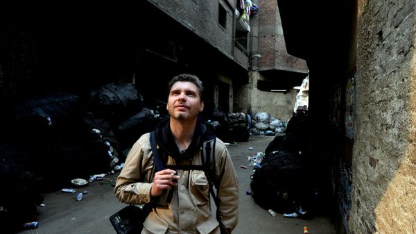 Phóng viên ảnh Andrey Stenin trên đường phố Cairo - Sputnik Việt Nam