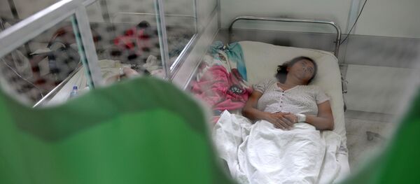 Người phụ nữ tại bệnh viện ở San Salvador - Sputnik Việt Nam