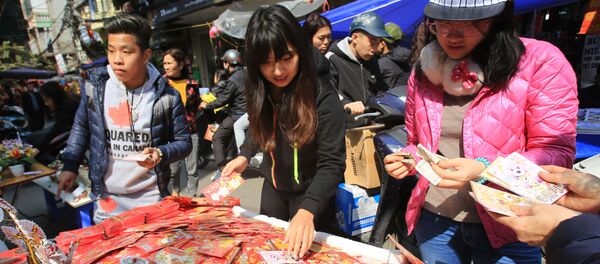 Chọn phong bì mừng tuổi theo phong tục Tết Chọn phong bì mừng tuổi theo phong tục Tết - Sputnik Việt Nam