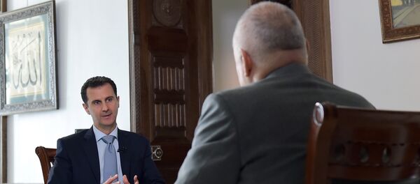 Tổng thống Syria Bashar Assad trả lời phỏng vấn độc quyền của ông Dmitry Kiselev (Rossiya Segodnya) - Sputnik Việt Nam