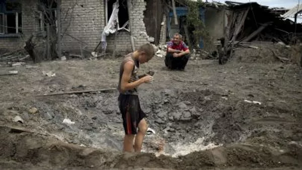 Người dân làng Luganskaya bị lực lượng vũ trang Ukraine không kích - Sputnik Việt Nam