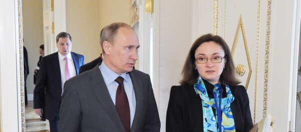 Tổng thống Nga Vladimir Putin và Thống đốc Ngân hàng Trung ương Nga  Elvira Nabiullina - Sputnik Việt Nam