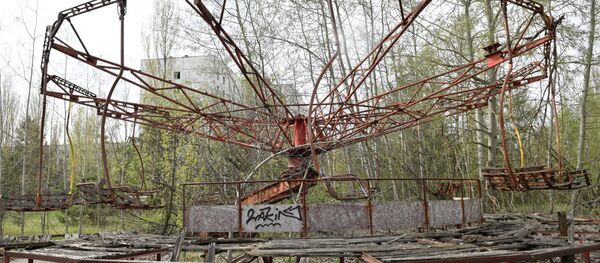 Công viên giải trí trong khu vực bị bỏ hoang sau vụ tai nạn nhà máy điện hạt nhân Chernobyl. - Sputnik Việt Nam