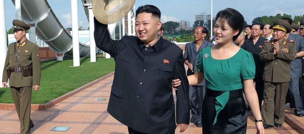 Nhà lãnh đạo Bắc Triều Tiên Kim Jong-un và người vợ - Sputnik Việt Nam