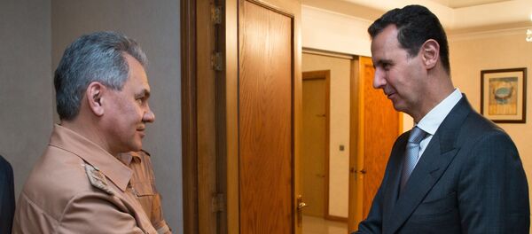 Bộ trưởng Quốc phòng Nga Sergei Shoigu và Tổng thống Syria Bashar al-Assad - Sputnik Việt Nam