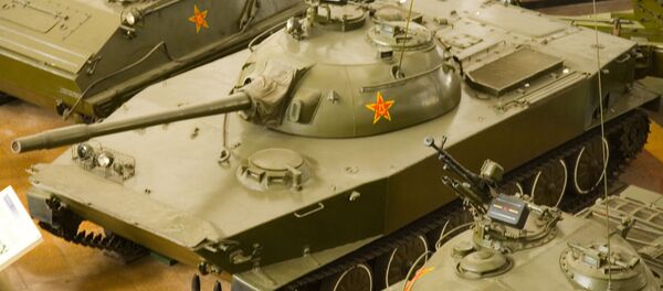 Китайский плавающий танк WZ-211 (Тип 63) в экспозиции Военного музея в Пекине Китайский плавающий танк WZ-211 (Тип 63) в экспозиции Военного музея в Пекине - Sputnik Việt Nam