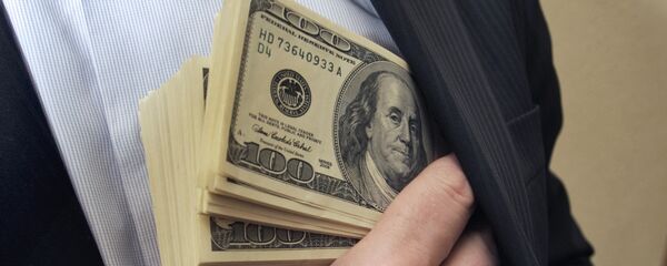 Nhà kinh doanh bỏ tiền vào túi - Sputnik Việt Nam