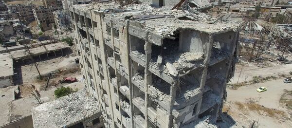 Tòa nhà bị phá hủy ở Bani Zeid, phía bắc Aleppo - Sputnik Việt Nam