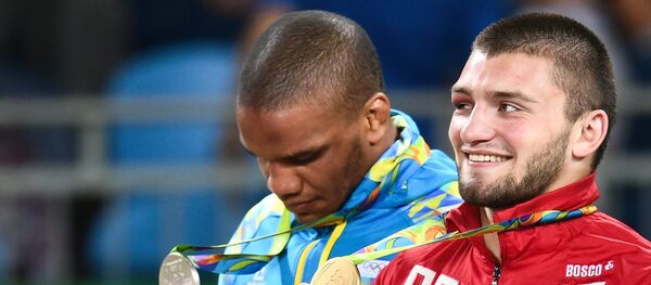 VĐV Ukraina Jan Belenyuk và VĐV Nga Davit Chakvetadze - Sputnik Việt Nam