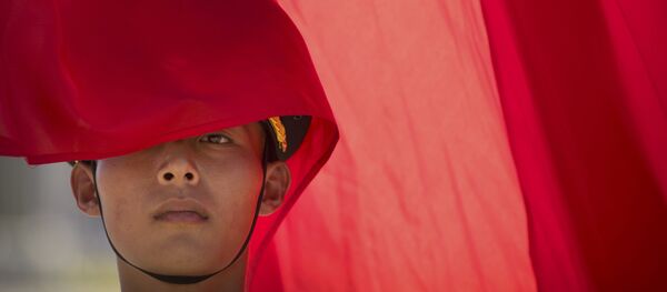 Офицер почетного караула во время приветственной церемонии в Пекине Офицер почетного караула во время приветственной церемонии в Пекине - Sputnik Việt Nam