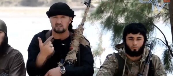 Gulmurod Khalimov (ngồi giữa) Gulmurod Khalimov (ngồi giữa) - Sputnik Việt Nam