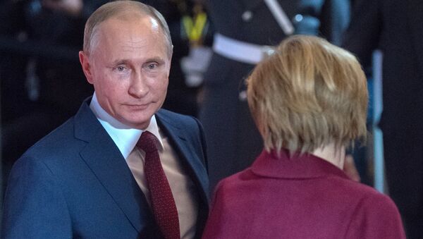 Tổng thống Nga Vladimir Putin và Thủ tướng Đức Angela Merkel - Sputnik Việt Nam