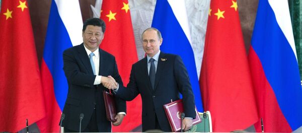 Tổng thống Nga Vladimir Putin và Chủ tịch Trung Quốc Tập Cận Bình - Sputnik Việt Nam