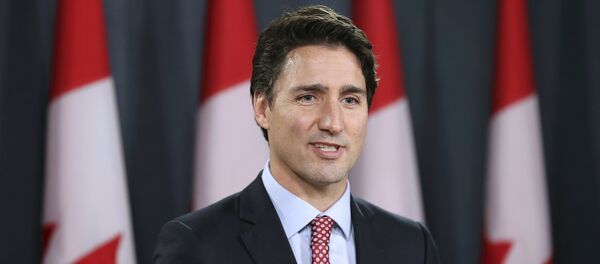 Canada's Liberal leader and Prime Minister-designate Justin Trudeau speaks during a news conference in Ottawa, Ontario, October 20, 2015 Canada's Liberal leader and Prime Minister-designate Justin Trudeau speaks during a news conference in Ottawa, Ontario, October 20, 2015 - Sputnik Việt Nam