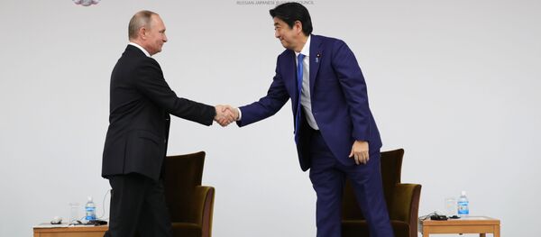 Vladimir Putin và Shinzo Abe - Sputnik Việt Nam