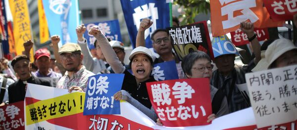 Người dân Tokyo phản đối luật quốc phòng mới của ông Abe Người dân Tokyo phản đối luật quốc phòng mới của ông Abe - Sputnik Việt Nam