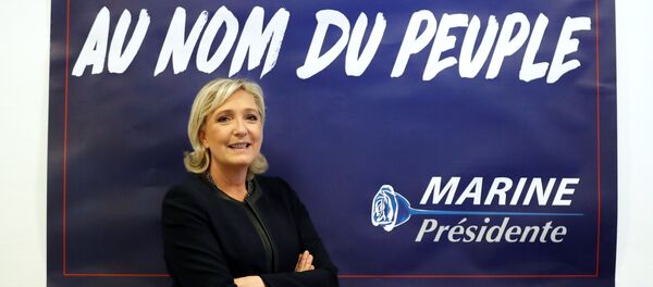 France's far-right National Front (FN) leader Marine Le Pen poses in front of a poster for her 2017 French presidential election campaign as she inaugurates her party campaign headquarters L'Escale in Paris, France, November 16, 2016. France's far-right National Front (FN) leader Marine Le Pen poses in front of a poster for her 2017 French presidential election campaign as she inaugurates her party campaign headquarters L'Escale in Paris, France, November 16, 2016. - Sputnik Việt Nam