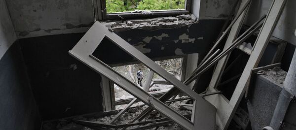 Ngôi nhà ở Donetsk bị hư hại do pháo kích - Sputnik Việt Nam