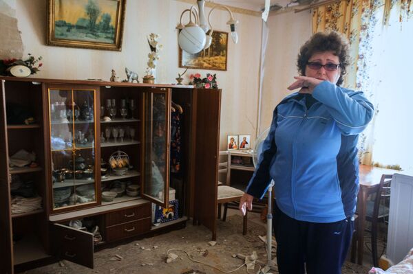 Một người phụ nữ ở Donetsk trong ngôi nhà bị quân Ucraine không kích Một người phụ nữ ở Donetsk trong ngôi nhà bị quân Ucraine không kích - Sputnik Việt Nam