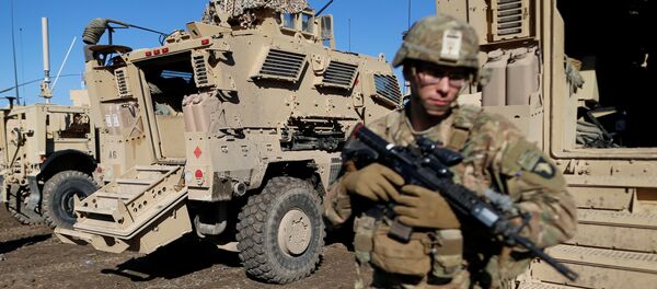 US. army soldiers stand next a military vehicle in the town of Bartella, east of Mosul, Iraq, December 27, 2016 - Sputnik Việt Nam