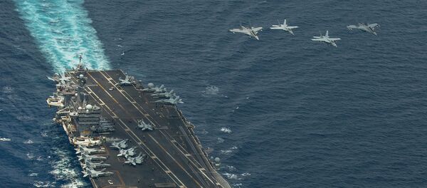 Two F/A-18 Super Hornets and two Royal Malaysian Air Force Mig 29 Fulcrum fly in formation above aircraft carrier USS Carl Vinson - Sputnik Việt Nam