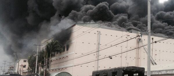 Đám cháy bùng phát vào ngày 23-3 tại công ty may. - Sputnik Việt Nam