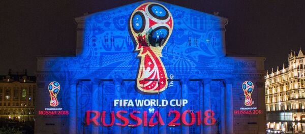 Giới thiệu logo của World Cup bóng đá 2018 trên mặt tiền Nhà hát Bolshoi ở Matxcơva Giới thiệu logo của World Cup bóng đá 2018 trên mặt tiền Nhà hát Bolshoi ở Matxcơva - Sputnik Việt Nam