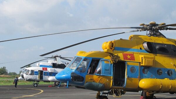 Trực thăng Trung đoàn 917 tham gia nhiệm vụ tìm kiếm cứu nạn tại sân bay Cà Mau. Trực thăng Trung đoàn 917 tham gia nhiệm vụ tìm kiếm cứu nạn tại sân bay Cà Mau. - Sputnik Việt Nam