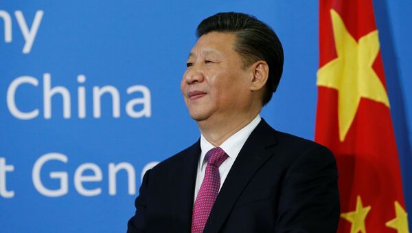 Chinese President Xi Jinping watches during a gift handover ceremony at the United Nations European headquarters in Geneva, Switzerland, January 18, 2017. - Sputnik Việt Nam