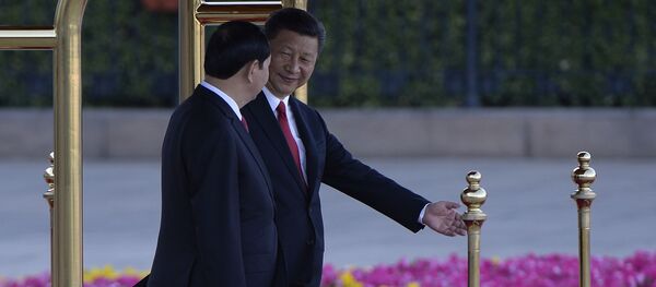 Chủ tịch Việt Nam Trần Đại Quang và lãnh đạo Trung Quốc Tập Cận Bình tại buổi lễ chào đón ở Bắc Kinh - Sputnik Việt Nam