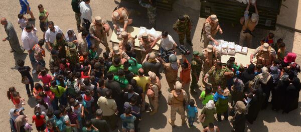 Syria. Phân phát viện trợ nhân đạo của Nga trong trại tị nạn ở tỉnh Latakia - Sputnik Việt Nam