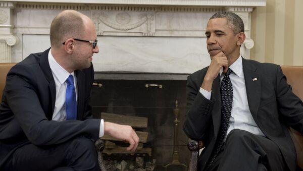 US President Barack Obama and Ukrainian Prime Minister Arseniy Yatsenyuk speak during meetings in the Oval Office of the White House in Washington, DC, March 12, 2014 - Sputnik Việt Nam