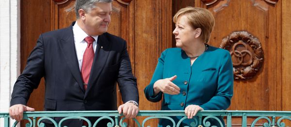 Ông Poroshenko và bà Merkel Ông Poroshenko và bà Merkel - Sputnik Việt Nam