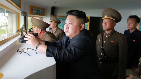 North Korean leader Kim Jong Un inspects the defence detachment on Jangjae Islet and the Hero Defence Detachment on Mu Islet located in the southernmost part of the waters off the southwest front, in this undated photo released by North Korea's Korean Central News Agency (KCNA) on May 5, 2017 - Sputnik Việt Nam