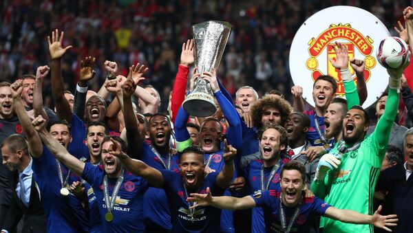 Các cầu thủ bóng đá của Manchester United sau chiến thắng trong Giải Cup UEFA. - Sputnik Việt Nam