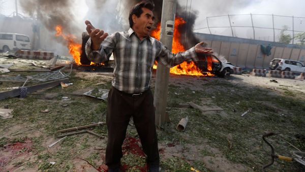 Tại hiện trường vụ nổ kế tiếp ở Kabul. Tại hiện trường vụ nổ kế tiếp ở Kabul. - Sputnik Việt Nam