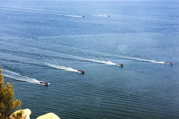 Nga và Trung Quốc tiến hành diễn tập đánh chiếm, kiểm soát đảo đá vào sáng ngày 18/9/2016.  - Sputnik Việt Nam