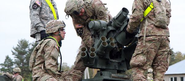 Members of the US Army 1st Brigade, 1st Cavalry Division, prepare Stryker Armored Vehicles at the railway station near the Rukla military base in Lithuania. (File) Members of the US Army 1st Brigade, 1st Cavalry Division, prepare Stryker Armored Vehicles at the railway station near the Rukla military base in Lithuania. (File) - Sputnik Việt Nam