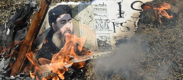 Thủ lĩnh IS Ibrahim Abu Bakr al-Baghdadi - Sputnik Việt Nam